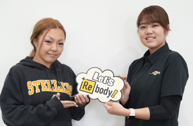 お客様とトレーナーのツーショット写真