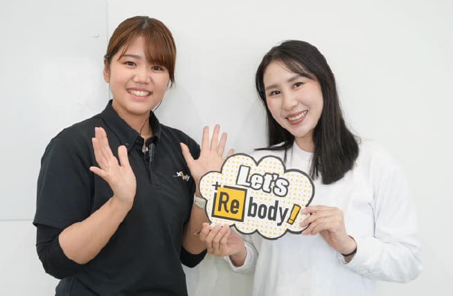お客様とトレーナーのツーショット写真